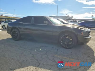 Czwarte zdjęcie samochodu z boku: 2010 DODGE CHARGER VIN:2B3AA4CT1AH248464 - miniatura