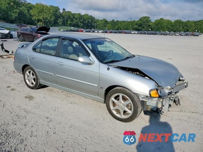 Czwarte zdjęcie samochodu z boku: 2002 NISSAN SENTRA SE-R VIN:3N1AB51D12L715083 - miniatura