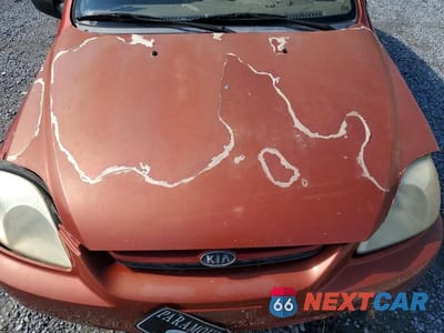Zdjęcie 11 z 12 samochodu: 2003 KIA RIO BASE VIN:KNADC125736211458 - miniatura