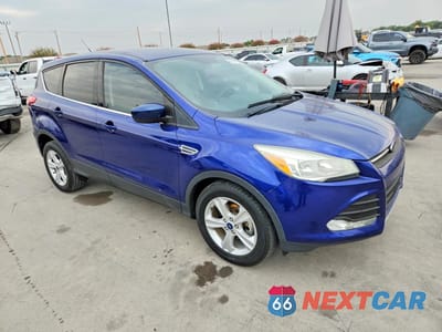 Czwarte zdjęcie samochodu z boku: 2015 FORD ESCAPE SE VIN:1FMCU0GX6FUC24908 - miniatura
