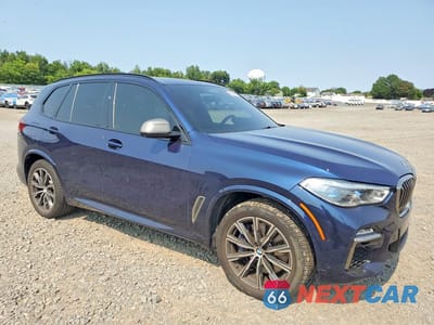 Czwarte zdjęcie samochodu z boku: 2021 BMW X5 M50I VIN:5UXJU4C09M9G19825 - miniatura
