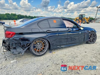 Trzecie zdjęcie samochodu z tyłu: 2016 BMW M5 VIN:WBSFV9C5XGG343609 - miniatura