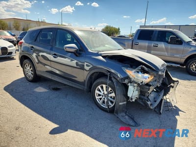 Czwarte zdjęcie samochodu z boku: 2015 MAZDA CX-5 TOURING VIN:JM3KE2CY2F0435710 - miniatura