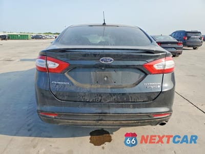 Zdjęcie 6 z 13 samochodu: 2014 FORD FUSION TITANIUM HEV VIN:3FA6P0RU1ER336619 - miniatura