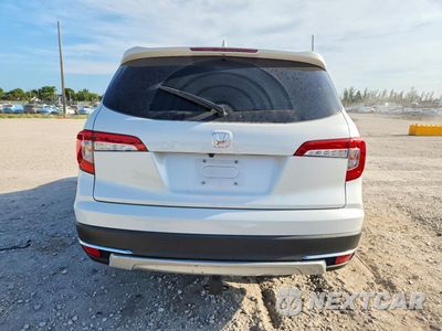 Zdjęcie 6 z 14 samochodu: 2022 HONDA PILOT TOURING VIN:5FNYF5H60NB020572 - miniatura