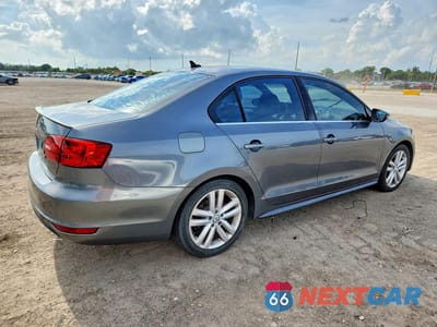 Trzecie zdjęcie samochodu z tyłu: 2013 VOLKSWAGEN JETTA GLI VIN:3VW5A7AJXDM244600 - miniatura