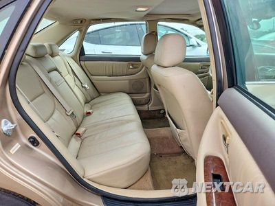 Zdjęcie 10 z 12 samochodu: 2001 TOYOTA AVALON XLS VIN:4T1BF28BX1U153936 - miniatura