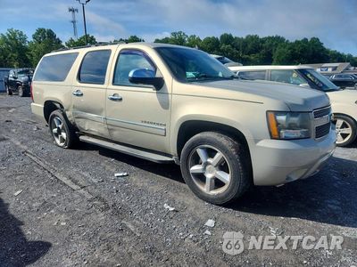 Czwarte zdjęcie samochodu z boku: 2011 CHEVROLET SUBURBAN K1500 LTZ VIN:1GNSKKE3XBR365812 - miniatura