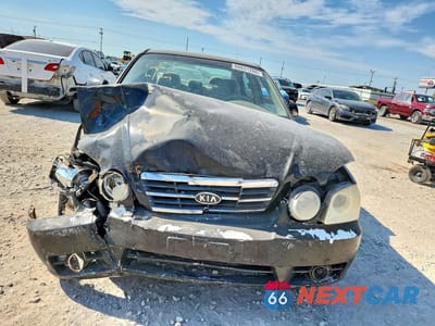 Piąte zdjęcie samochodu w środku: 2006 KIA OPTIMA LX V6 VIN:KNAGD128765439250 - miniatura