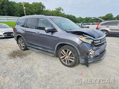 Czwarte zdjęcie samochodu z boku: 2017 HONDA PILOT TOURING VIN:5FNYF5H92HB008387 - miniatura