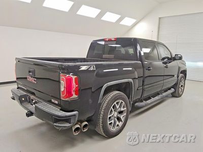 Trzecie zdjęcie samochodu z tyłu: 2017 GMC SIERRA K1500 SLT VIN:3GTU2NEJ7HG166906 - miniatura