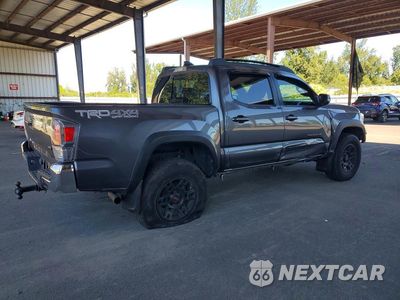 Trzecie zdjęcie samochodu z tyłu: 2022 TOYOTA TACOMA TRD OFF-ROAD VIN:3TYCZ5AN4NT079823 - miniatura