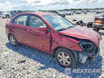 Czwarte zdjęcie samochodu z boku: 2010 HYUNDAI ACCENT GLS VIN:KMHCN4AC1AU406793 - miniatura