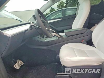 Zdjęcie 7 z 14 samochodu: 2023 TESLA MODEL Y VIN:7SAYGDEF2PF832716 - miniatura