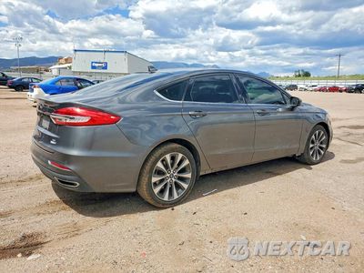 Trzecie zdjęcie samochodu z tyłu: 2019 FORD FUSION SE VIN:3FA6P0T9XKR237376 - miniatura