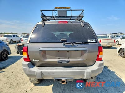 Zdjęcie 6 z 13 samochodu: 1999 JEEP GRAND CHEROKEE LAREDO VIN:1J4GW58S5XC687799 - miniatura