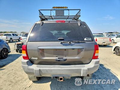 Zdjęcie 6 z 13 samochodu: 1999 JEEP GRAND CHEROKEE LAREDO VIN:1J4GW58S5XC687799 - miniatura