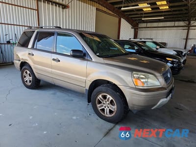 Czwarte zdjęcie samochodu z boku: 2004 HONDA PILOT EXL VIN:2HKYF18504H518707 - miniatura