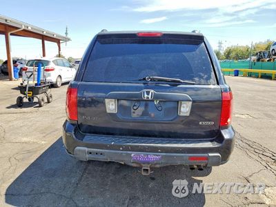 Zdjęcie 6 z 12 samochodu: 2006 HONDA PILOT EX VIN:2HKYF18446H531969 - miniatura