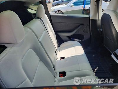 Zdjęcie 11 z 13 samochodu: 2025 TESLA MODEL Y VIN:7SAYGDEE1SA342300 - miniatura