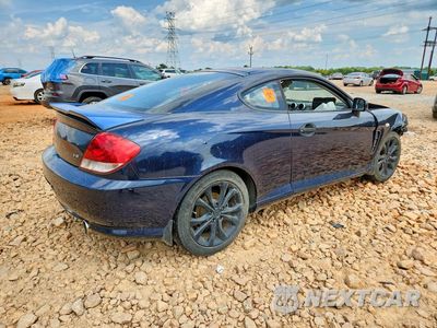 Trzecie zdjęcie samochodu z tyłu: 2006 HYUNDAI TIBURON GT VIN:KMHHN65F16U190487 - miniatura