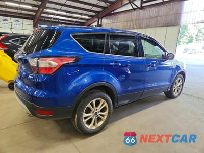 Trzecie zdjęcie samochodu z tyłu: 2017 FORD ESCAPE SE VIN:1FMCU9GD7HUE61419 - miniatura