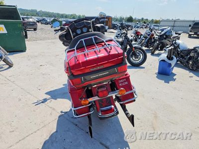 Czwarte zdjęcie samochodu z boku: 2011 HARLEY-DAVIDSON FLHTK VIN:1HD1KEM18BB618560 - miniatura