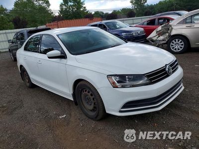 Czwarte zdjęcie samochodu z boku: 2017 VOLKSWAGEN JETTA S VIN:3VW167AJ9HM359016 - miniatura