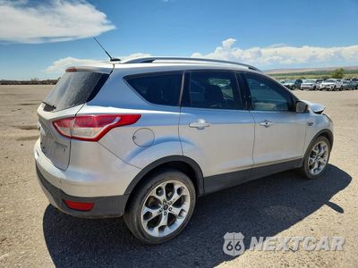 Trzecie zdjęcie samochodu z tyłu: 2016 FORD ESCAPE TITANIUM VIN:1FMCU0JX5GUA10969 - miniatura
