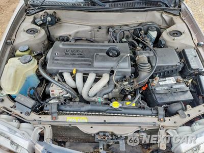 Zdjęcie 11 z 12 samochodu: 2002 TOYOTA COROLLA CE VIN:1NXBR12E22Z573650 - miniatura