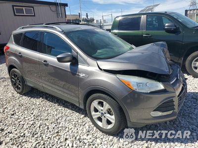 Czwarte zdjęcie samochodu z boku: 2014 FORD ESCAPE SE VIN:1FMCU0GX1EUC30534 - miniatura