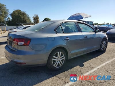 Trzecie zdjęcie samochodu z tyłu: 2018 VOLKSWAGEN JETTA S VIN:3VW167AJ6JM232553 - miniatura