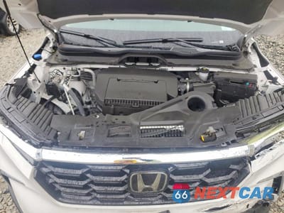 Zdjęcie 12 z 13 samochodu: 2025 HONDA PILOT TOURING VIN:5FNYG1H78SB120347 - miniatura