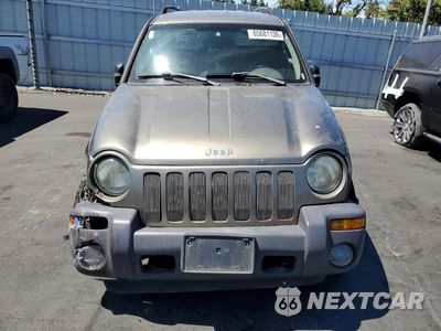 Piąte zdjęcie samochodu w środku: 2004 JEEP LIBERTY SPORT VIN:1J4GL48K94W322460 - miniatura