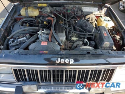 Zdjęcie 12 z 13 samochodu: 1990 JEEP CHEROKEE LAREDO VIN:1J4FJ57L0LL286627 - miniatura