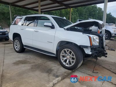 Czwarte zdjęcie samochodu z boku: 2016 GMC YUKON SLT VIN:1GKS1BKC0GR373364 - miniatura