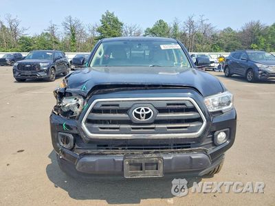Piąte zdjęcie samochodu w środku: 2017 TOYOTA TACOMA SR5 V6 VIN:3TMDZ5BN5HM023778 - miniatura