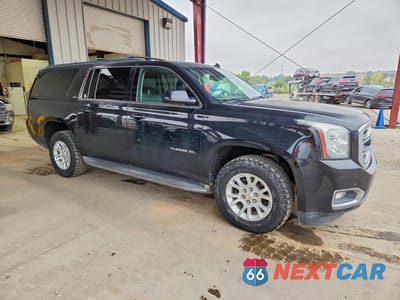 Czwarte zdjęcie samochodu z boku: 2015 GMC YUKON XL K1500 SLT VIN:1GKS2HKC6FR203346 - miniatura