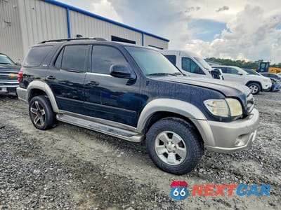 Czwarte zdjęcie samochodu z boku: 2002 TOYOTA SEQUOIA SR5 VIN:5TDZT34A72S067729 - miniatura