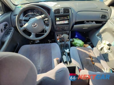 Zdjęcie 8 z 12 samochodu: 2000 MAZDA PROTEGE ES VIN:JM1BJ223XY0280045 - miniatura