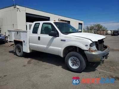 Czwarte zdjęcie samochodu z boku: 2004 FORD F350 SRW SUPER DUTY VIN:1FTSX31S74EB36169 - miniatura