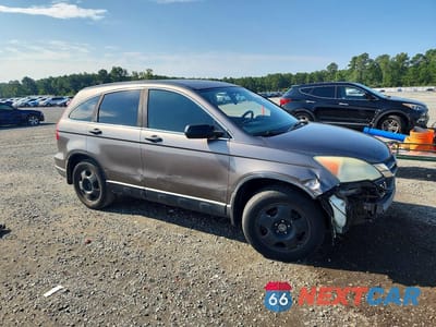 Czwarte zdjęcie samochodu z boku: 2010 HONDA CR-V LX VIN:3CZRE3H30AG703243 - miniatura