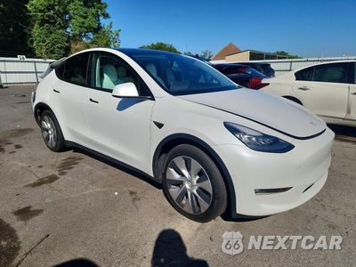 Czwarte zdjęcie samochodu z boku: 2022 TESLA MODEL Y VIN:7SAYGDEE9NF310945 - miniatura