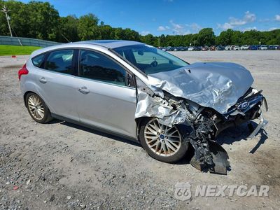 Czwarte zdjęcie samochodu z boku: 2014 FORD FOCUS TITANIUM VIN:1FADP3N24EL409932 - miniatura