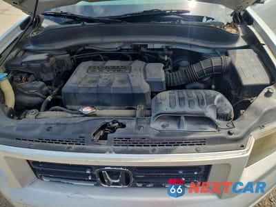 Zdjęcie 11 z 12 samochodu: 2006 HONDA RIDGELINE RTS VIN:2HJYK16486H569076 - miniatura