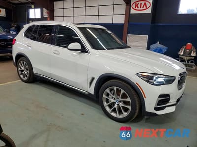Czwarte zdjęcie samochodu z boku: 2022 BMW X5 XDRIVE45E VIN:5UXTA6C02N9M26931 - miniatura