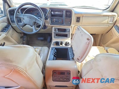 Zdjęcie 8 z 13 samochodu: 2003 GMC YUKON XL C1500 VIN:1GKEC16Z73R219311 - miniatura