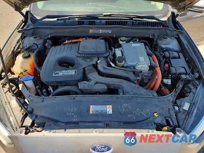 Zdjęcie 11 z 12 samochodu: 2014 FORD FUSION SE PHEV VIN:3FA6P0PUXER256237 - miniatura