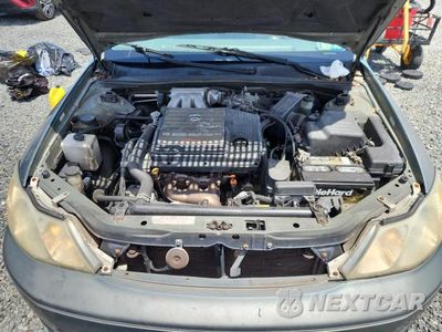 Zdjęcie 11 z 12 samochodu: 2001 TOYOTA AVALON XL VIN:4T1BF28B71U155109 - miniatura