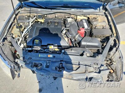 Zdjęcie 11 z 12 samochodu: 2011 LINCOLN MKZ VIN:3LNHL2GC1BR757834 - miniatura